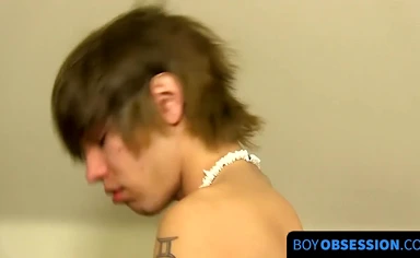 Passionate twink stuffs his ass with dildo while jerking off solo